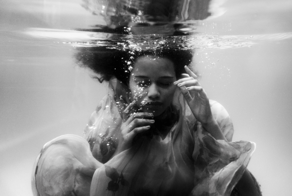 girl breathing underwater