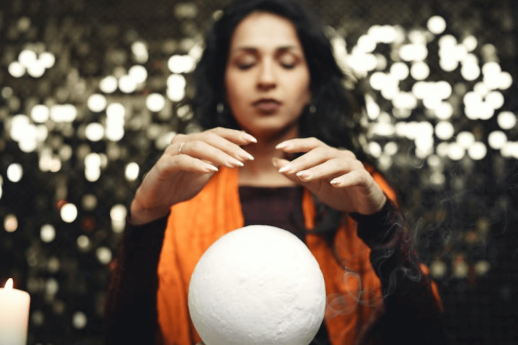 clairvoyant using a crystal ball