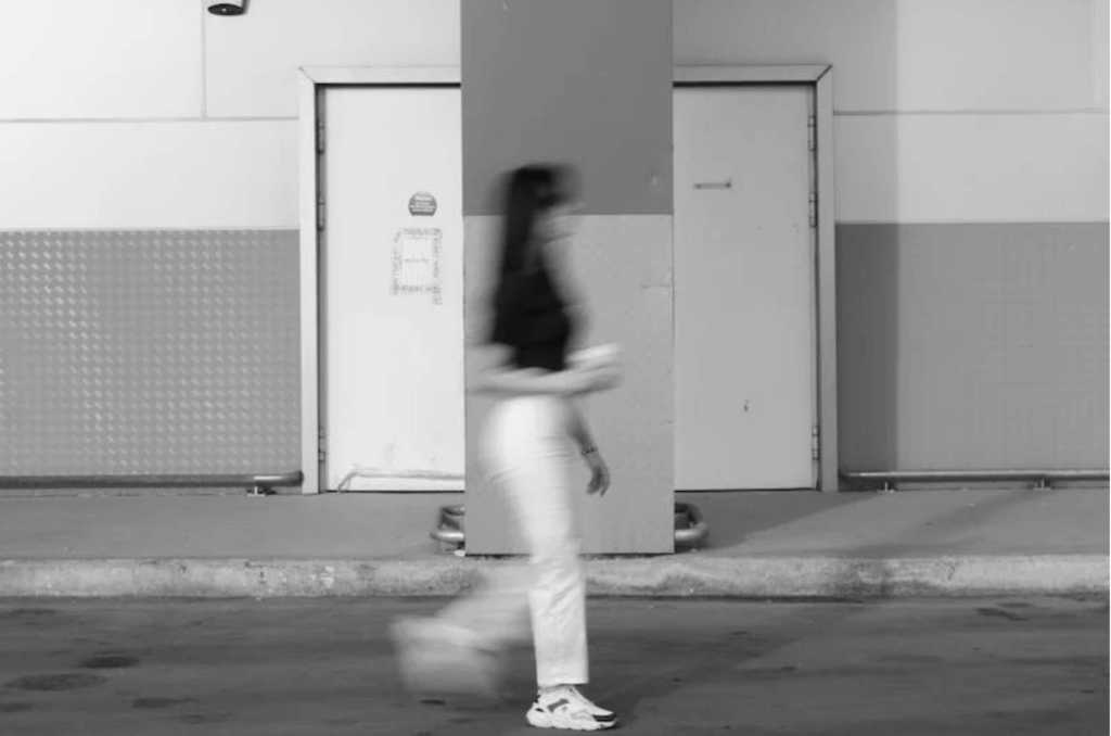 blurry picture of woman walking