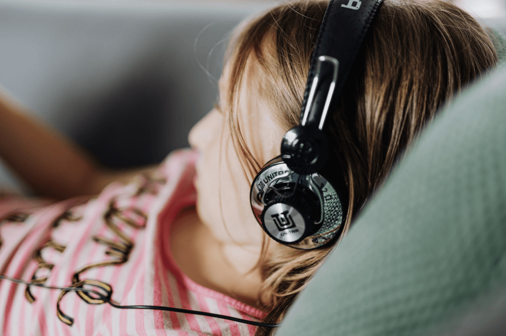 girl listening to headphones